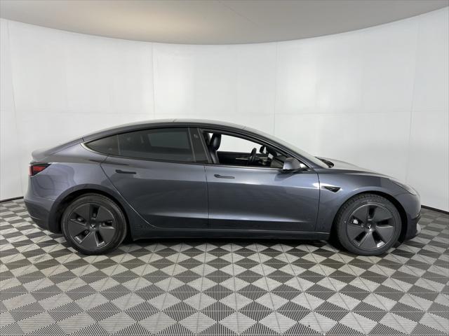 used 2023 Tesla Model 3 car, priced at $26,575