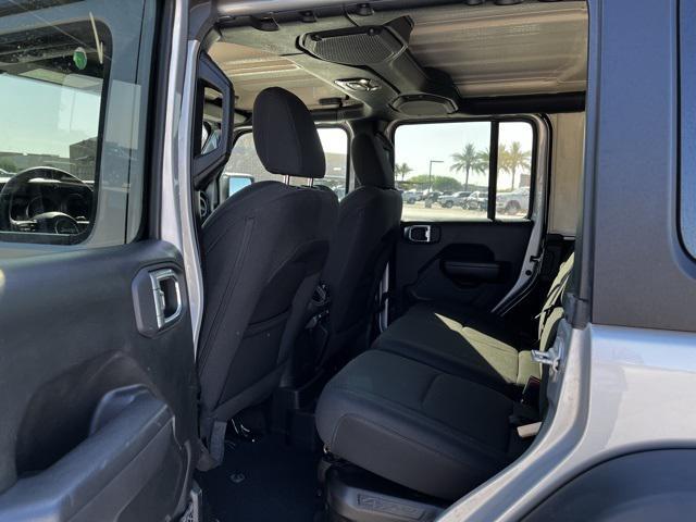 used 2023 Jeep Wrangler 4xe car, priced at $27,673