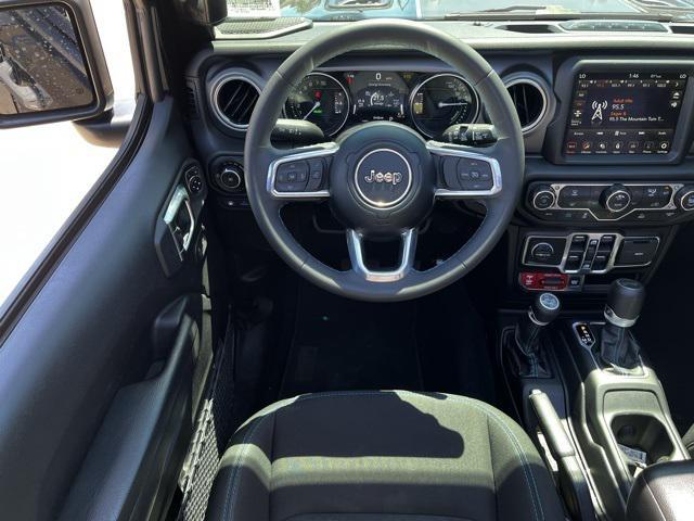 used 2023 Jeep Wrangler 4xe car, priced at $33,575