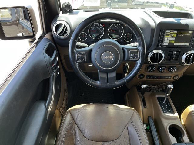 used 2014 Jeep Wrangler Unlimited car, priced at $18,995