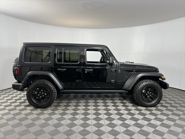 used 2021 Jeep Wrangler Unlimited car, priced at $31,975