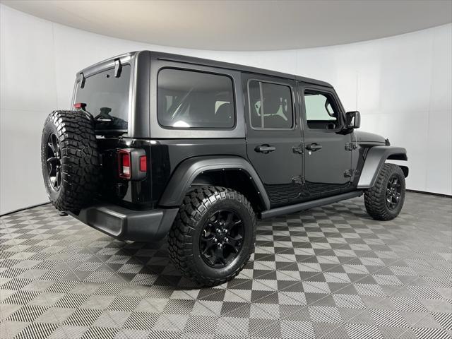 used 2021 Jeep Wrangler Unlimited car, priced at $31,975