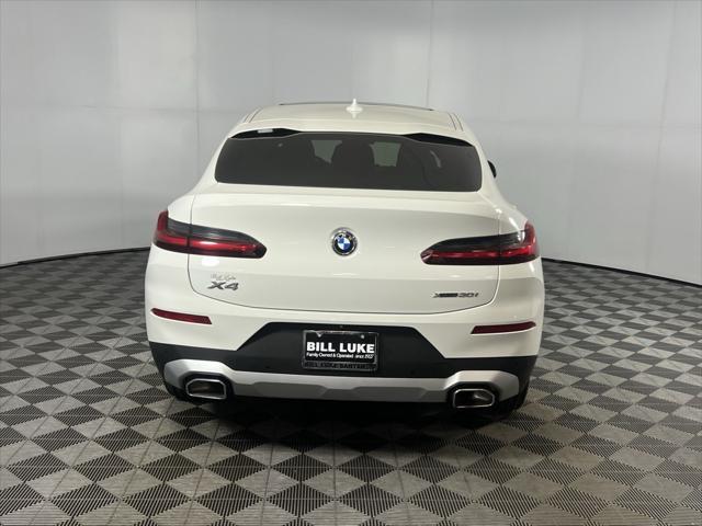 used 2022 BMW X4 car, priced at $39,373