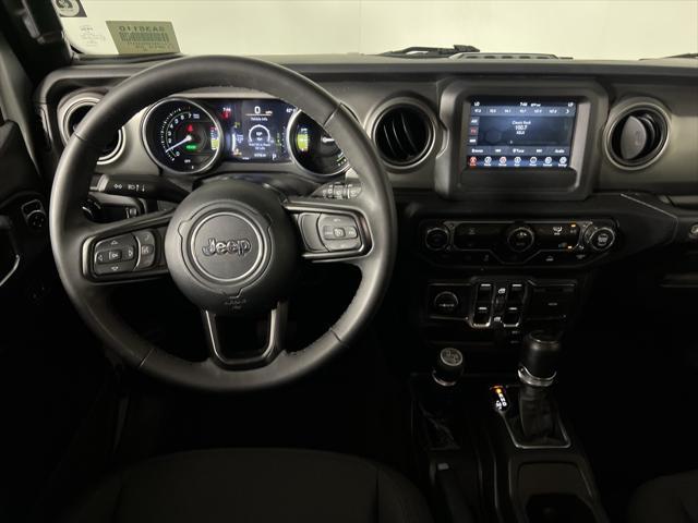 used 2023 Jeep Wrangler 4xe car, priced at $27,873