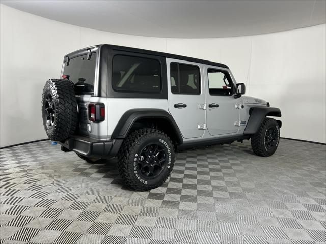 used 2023 Jeep Wrangler 4xe car, priced at $27,873