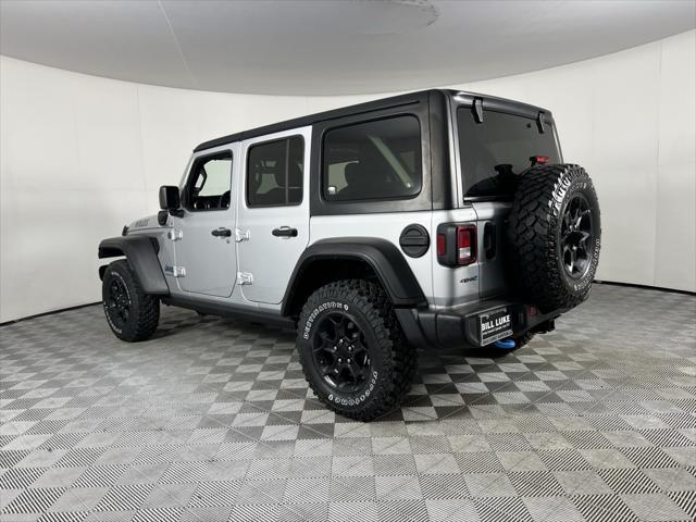 used 2023 Jeep Wrangler 4xe car, priced at $27,873