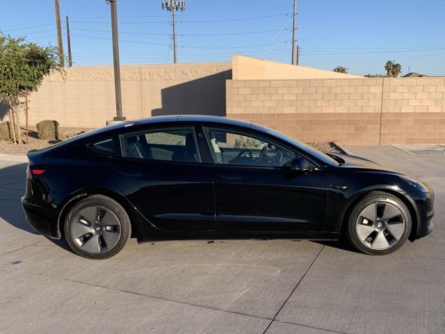 used 2022 Tesla Model 3 car, priced at $27,673