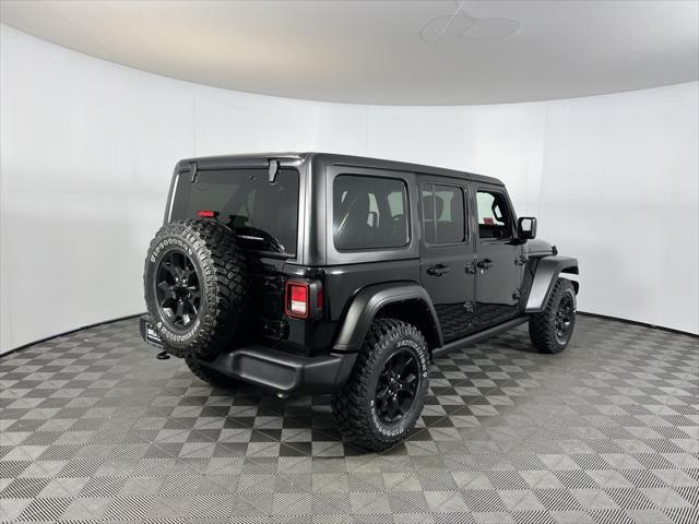 used 2021 Jeep Wrangler Unlimited car, priced at $30,973