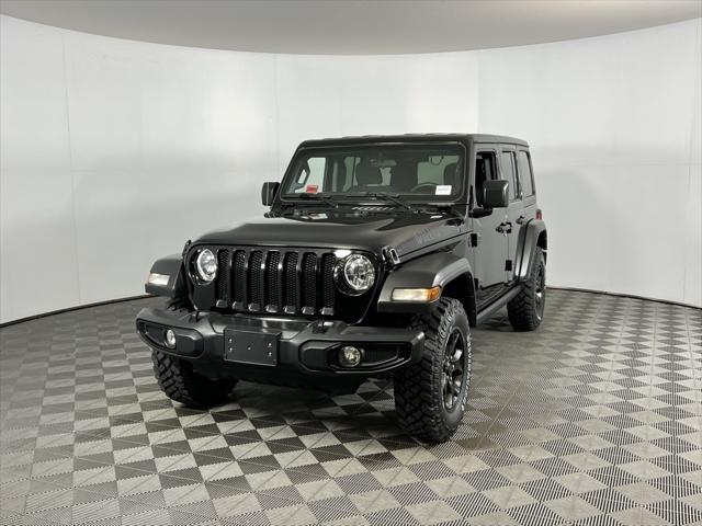 used 2021 Jeep Wrangler Unlimited car, priced at $30,973