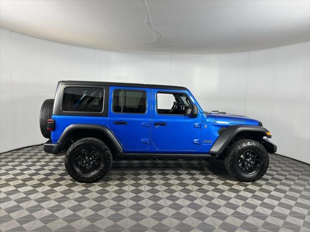 used 2024 Jeep Wrangler 4xe car, priced at $33,373