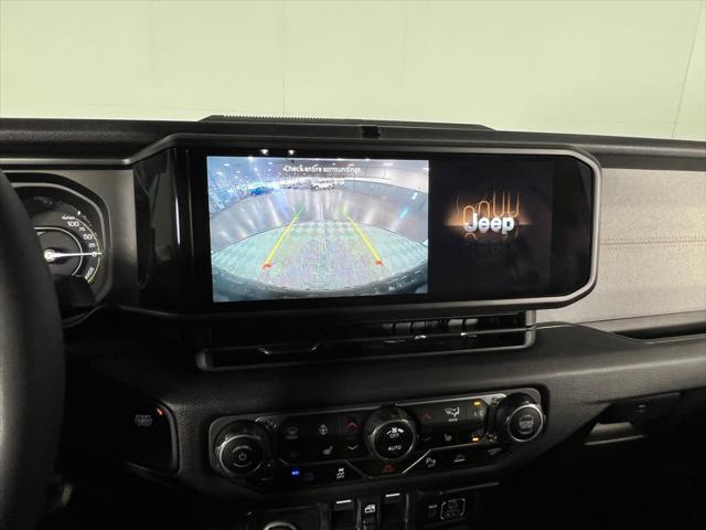 used 2024 Jeep Wrangler 4xe car, priced at $33,373