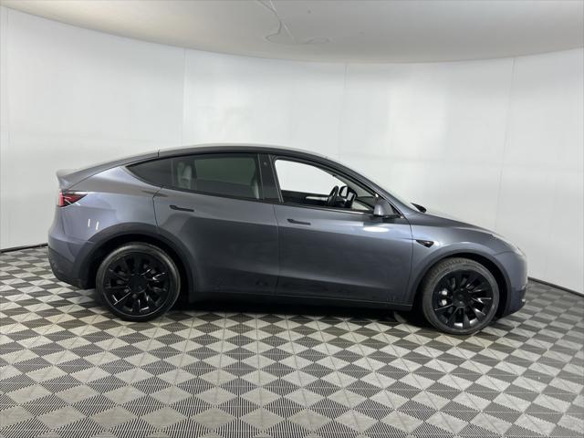 used 2023 Tesla Model Y car, priced at $33,575