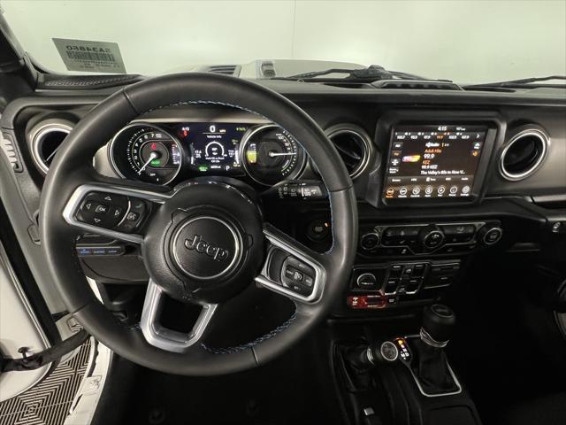 used 2023 Jeep Wrangler 4xe car, priced at $31,673