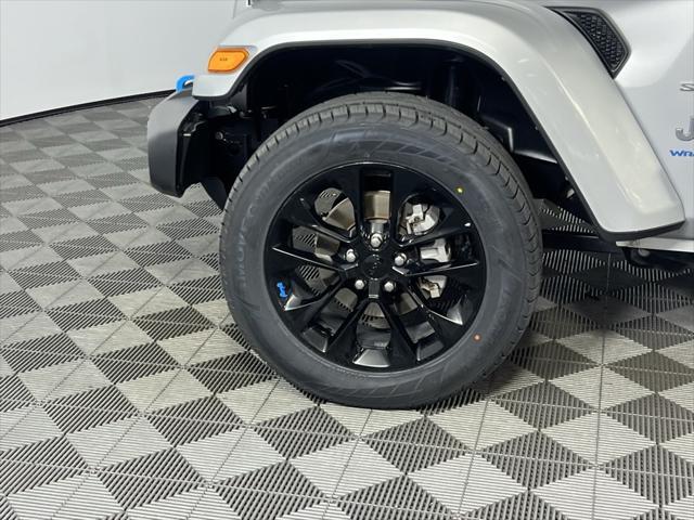 used 2023 Jeep Wrangler 4xe car, priced at $27,173