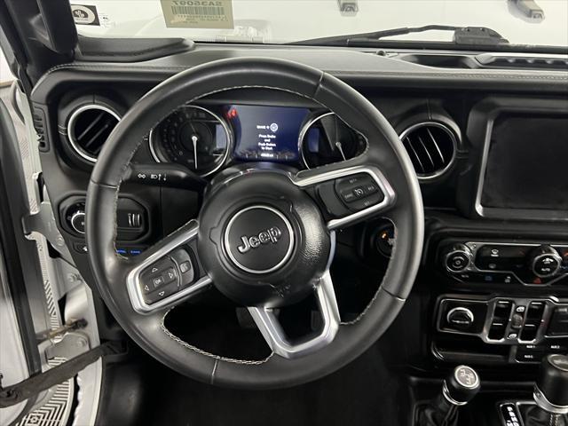 used 2023 Jeep Wrangler 4xe car, priced at $27,173