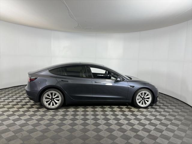 used 2023 Tesla Model 3 car, priced at $28,473