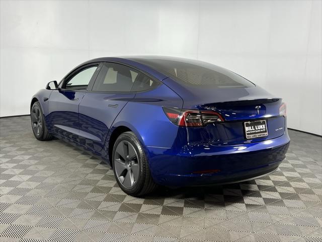 used 2023 Tesla Model 3 car, priced at $32,000