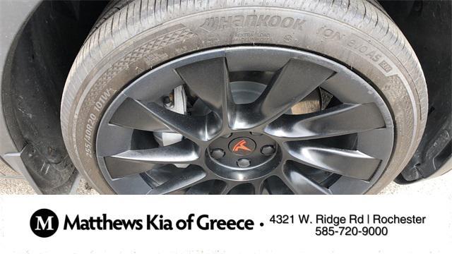 used 2023 Tesla Model Y car, priced at $31,000