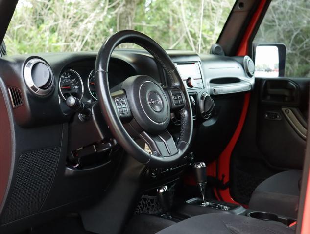 used 2013 Jeep Wrangler Unlimited car, priced at $15,998