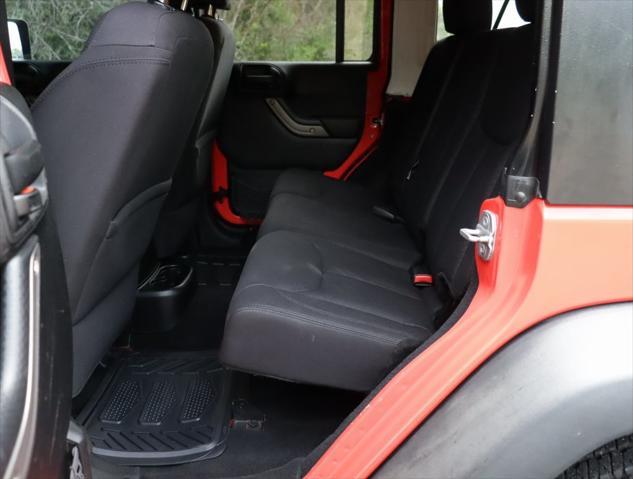 used 2013 Jeep Wrangler Unlimited car, priced at $15,998