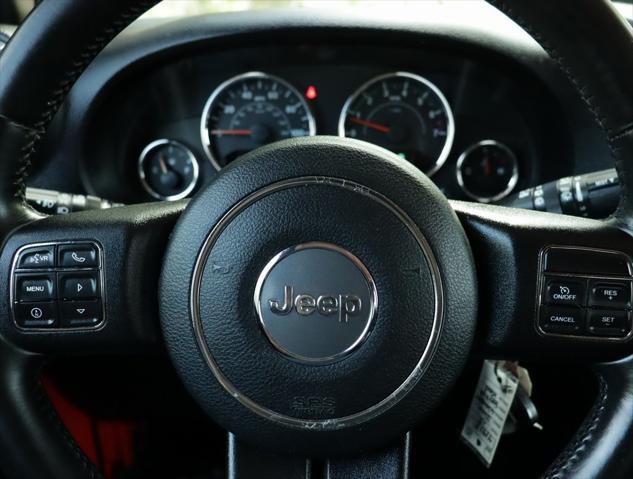 used 2013 Jeep Wrangler Unlimited car, priced at $15,998