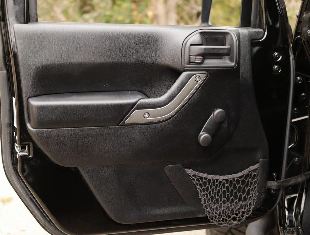 used 2016 Jeep Wrangler Unlimited car, priced at $25,998