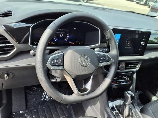 new 2025 Volkswagen Taos car, priced at $28,500