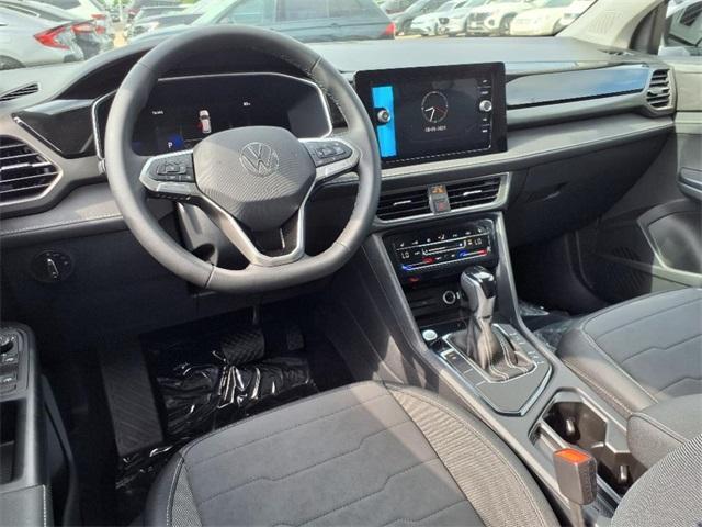 new 2025 Volkswagen Taos car, priced at $28,500