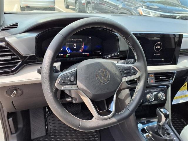 new 2025 Volkswagen Taos car, priced at $26,500