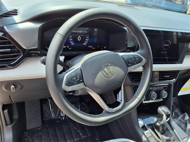 new 2025 Volkswagen Taos car, priced at $27,000