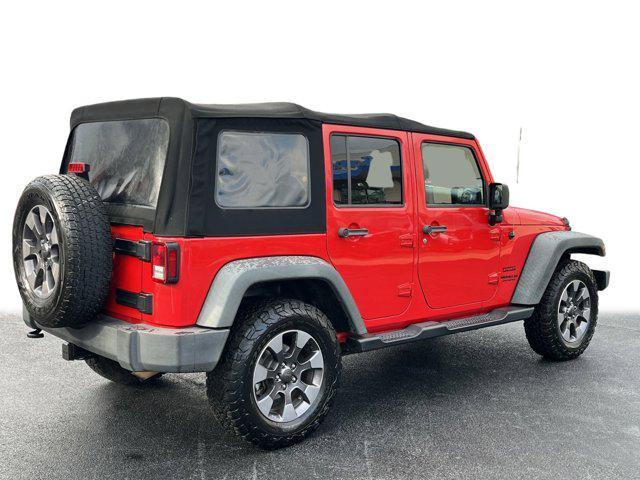 used 2015 Jeep Wrangler Unlimited car, priced at $15,877