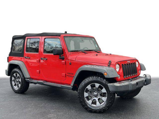 used 2015 Jeep Wrangler Unlimited car, priced at $15,877