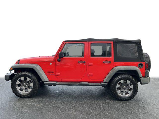 used 2015 Jeep Wrangler Unlimited car, priced at $15,877