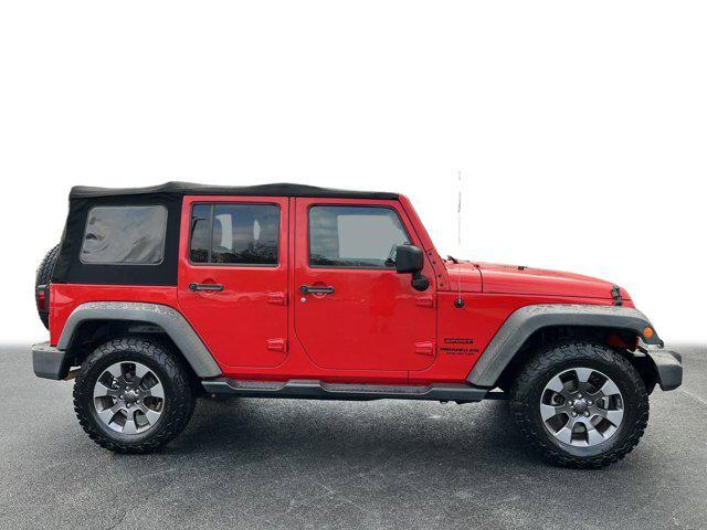 used 2015 Jeep Wrangler Unlimited car, priced at $15,877