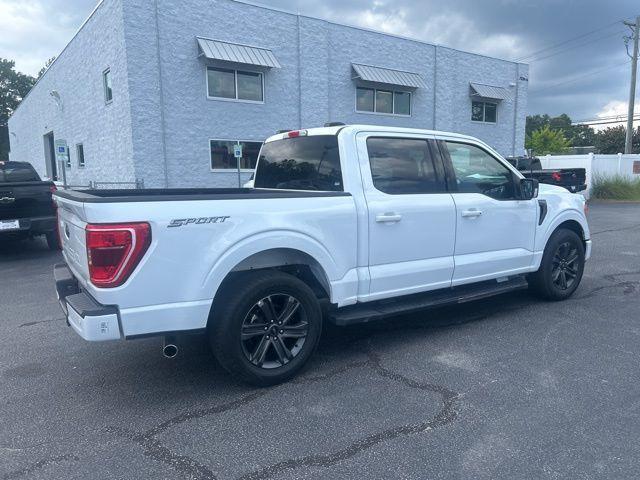 used 2023 Ford F-150 car, priced at $33,900
