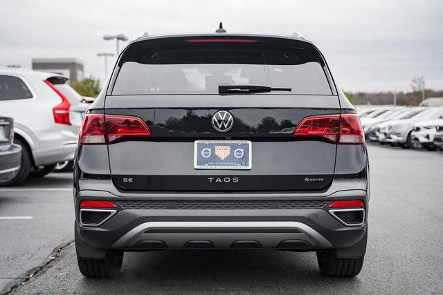 used 2023 Volkswagen Taos car, priced at $22,500