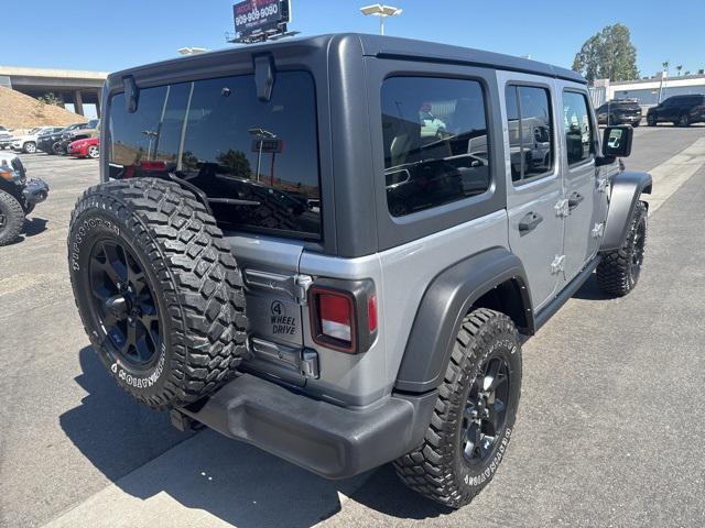 used 2021 Jeep Wrangler car, priced at $34,183