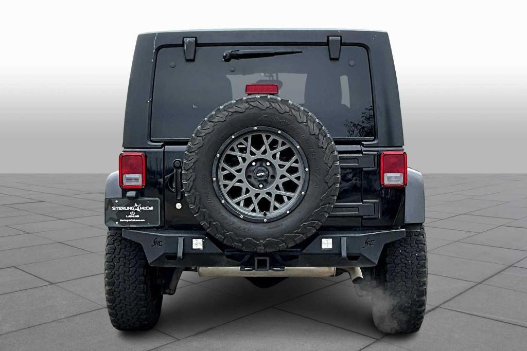 used 2014 Jeep Wrangler Unlimited car, priced at $18,995