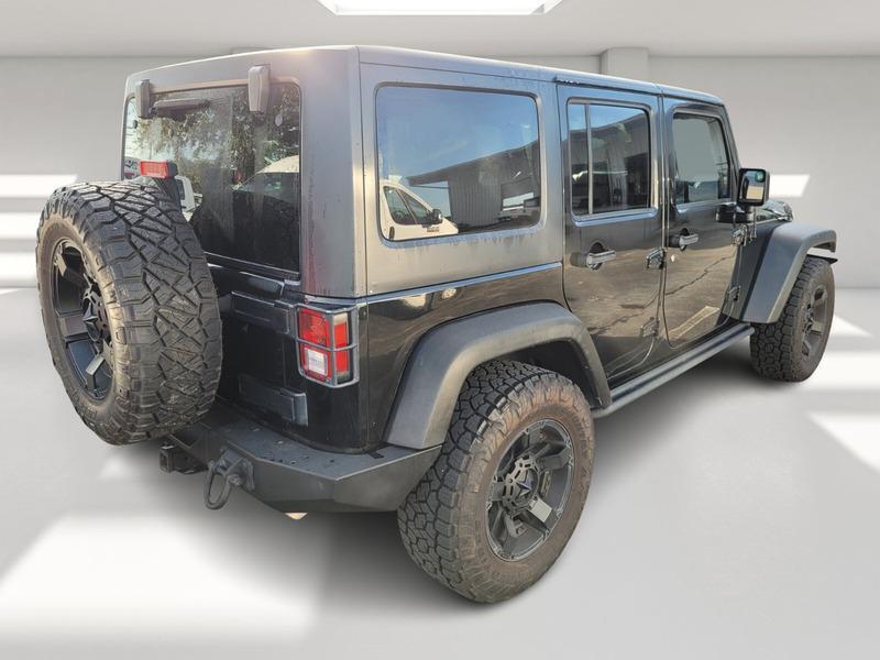 used 2016 Jeep Wrangler Unlimited car, priced at $19,447