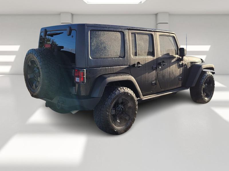 used 2016 Jeep Wrangler Unlimited car, priced at $18,897