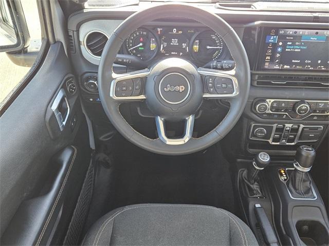 used 2024 Jeep Wrangler 4xe car, priced at $34,755
