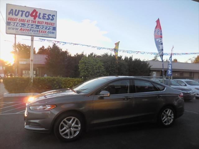 used 2014 Ford Fusion car, priced at $11,991