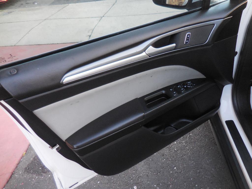 used 2015 Ford Fusion car, priced at $9,991