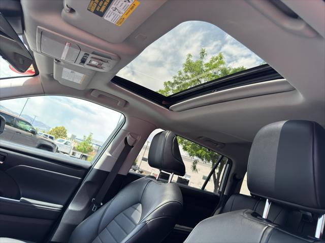 used 2022 Toyota Highlander Hybrid car, priced at $37,299