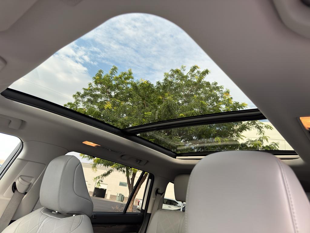 used 2020 Toyota Highlander Hybrid car, priced at $32,179