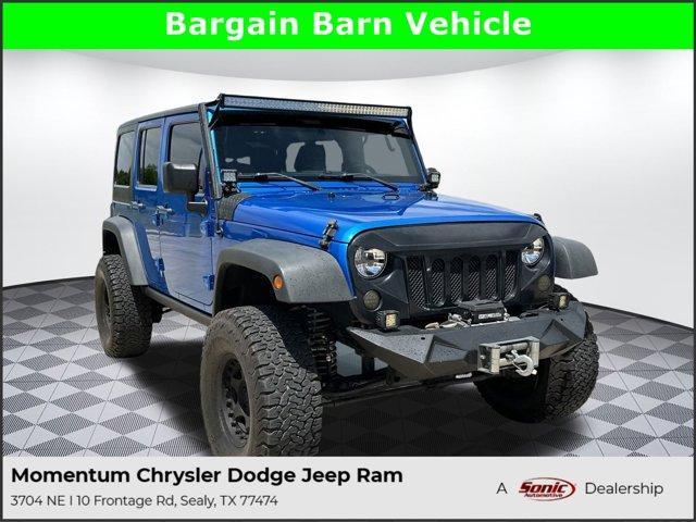 used 2015 Jeep Wrangler Unlimited car, priced at $21,597