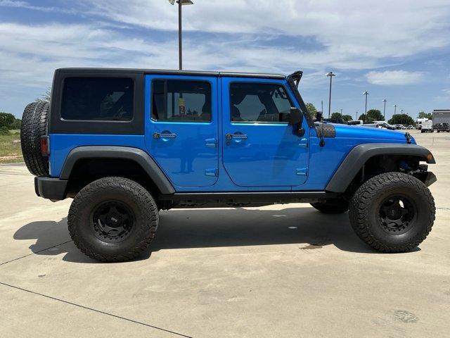 used 2015 Jeep Wrangler Unlimited car, priced at $22,298
