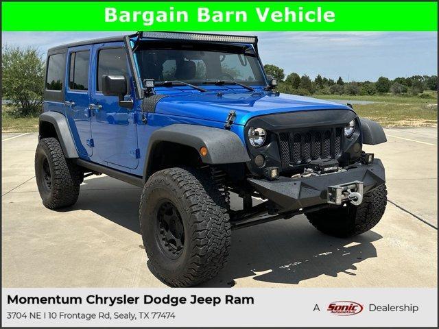used 2015 Jeep Wrangler Unlimited car, priced at $19,996
