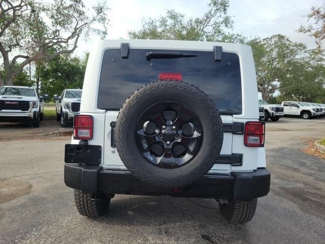 used 2015 Jeep Wrangler Unlimited car, priced at $19,004