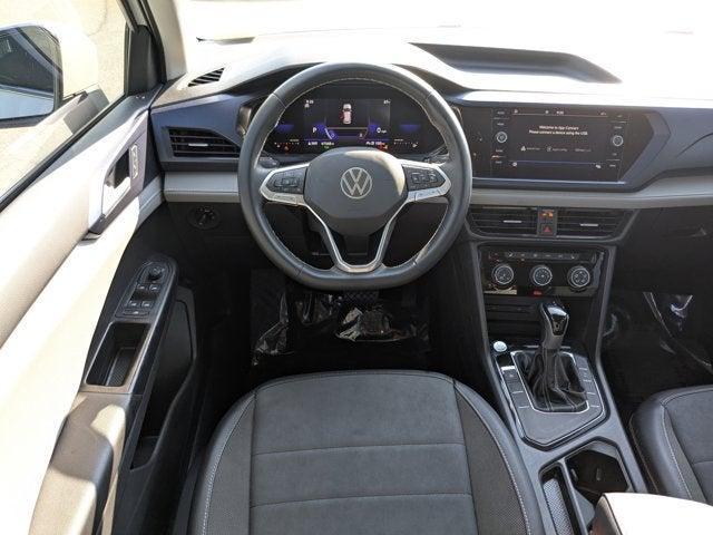 used 2023 Volkswagen Taos car, priced at $19,203
